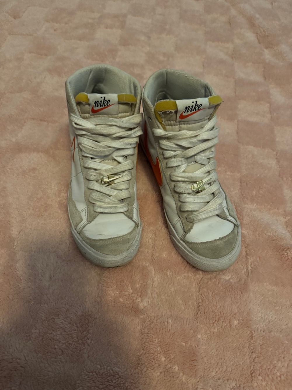 Nike Women's White Sneakers with Orange Swoosh and Yellow Tongue Accents